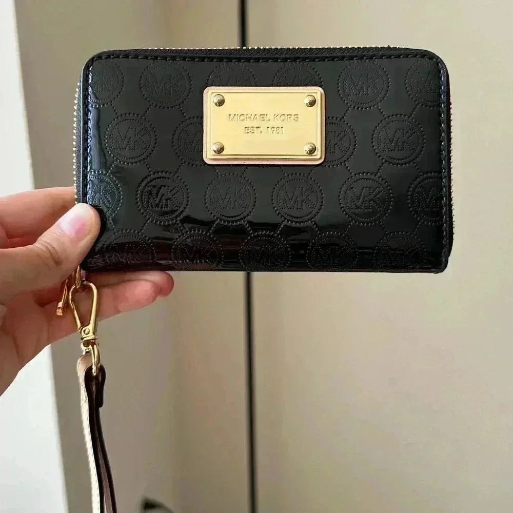 Michael Kors Black Wristlet with Gold Accents